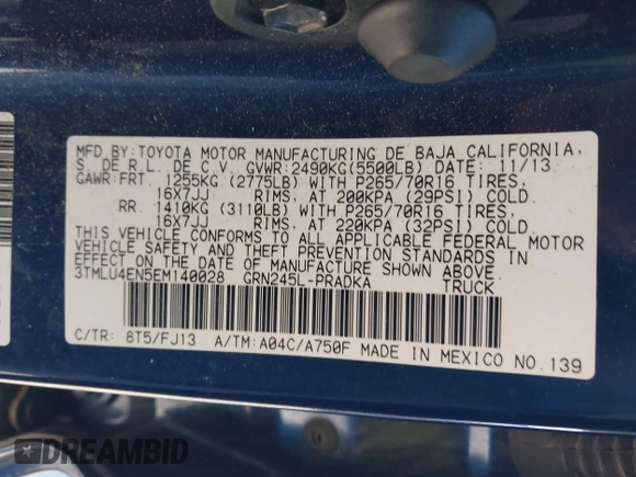 2014 Toyota Tacoma with VIN 3TMLU4EN5EM140028, listed as a IAAI auction lot 40965372 with 94,372 mi miles and . Bid and sale history available at DreamBid. Image 9.