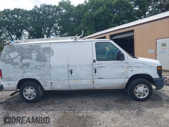 2012 Ford Econoline Cargo Commercial with VIN 1FTNE1EW9CDA86738, listed as a IAAI auction lot 42464315 with 180,322 mi miles and . Bid and sale history available at DreamBid. Image 13.