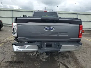 2021 Ford F-150 XL with VIN 1FTMF1E57MKD42212, listed as a Copart auction lot 61053984 with Not provided miles and Salvage title. Bid and sale history available at DreamBid. Image 6.