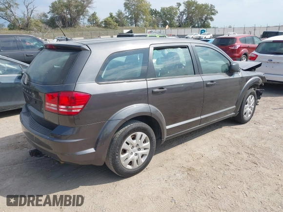 2015 Dodge Journey American Value Pkg with VIN 3C4PDCAB2FT641361, listed as a IAAI auction lot 40299991 with 202,003 mi miles. Bid and sale history available at carsss.com. Image 4.