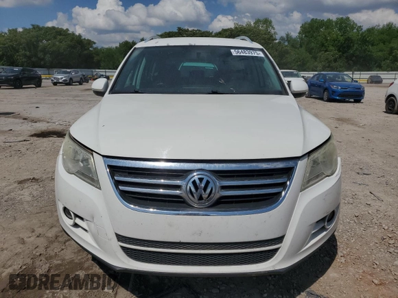 2011 Volkswagen Tiguan SEL w/Premium Navi z VIN WVGAV7AX1BW540155, wystawiony jako Copart lot #56483975 z przebiegiem 137 970 mil mil oraz Czysty tytuł • Clean title. Historia ofert i sprzedaży dostępna na DreamBid. Obrazek 5.