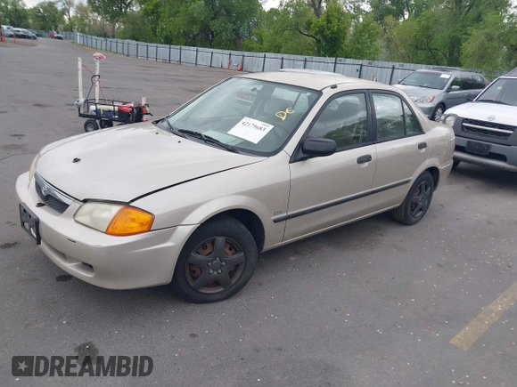 2000 Mazda Protege DX with VIN JM1BJ2227Y0237323, listed as a IAAI auction lot 42179683 with Not Provided miles and . Bid and sale history available at DreamBid. Image 2.