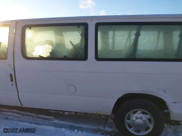 2010 Ford Econoline Wagon XL with VIN 1FBSS3BL9ADA55363, listed as a IAAI auction lot 41179750 with 127,918 mi miles. Bid and sale history available at carsss.com. Image 15.