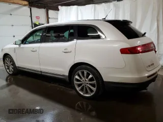 2012 Lincoln MKT EcoBoost with VIN 2LMHJ5AT9CBL50946, listed as a Copart auction lot 48763435 with 127,704 mi miles and Clean Title. Bid and sale history available at DreamBid. Image 2.