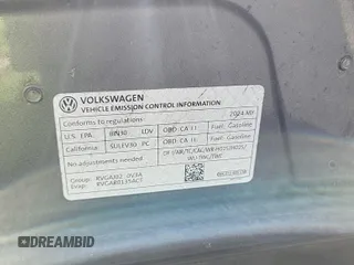2024 Volkswagen Tiguan SE with VIN 3VV3B7AX8RM107014, listed as a IAAI auction lot 42734341 with 27,789 mi miles and . Bid and sale history available at DreamBid. Image 22.