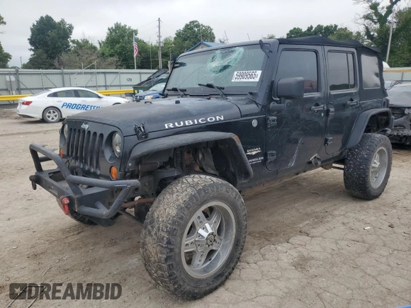 2007 Jeep Wrangler Unlimited Rubicon with VIN 1J4GA69117L112867, listed as a Copart auction lot 59909565 with 166,963 mi miles and Salvage title. Bid and sale history available at DreamBid. Image 1.