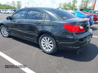 2010 Chrysler Sebring Limited with VIN 1C3CC5FB9AN147436, listed as a IAAI auction lot 42016922 with 161,339 mi miles and . Bid and sale history available at DreamBid. Image 3.