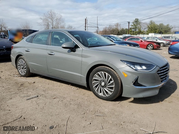 2021 Hyundai Sonata Hybrid SEL with VIN KMHL34JJ0MA022272, listed as a Copart auction lot 48867015 with 96,061 mi miles and Salvage Title. Bid and sale history available at carsss.com. Image 4.