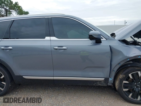 2023 Kia Telluride SX Prestige X-Line z VIN 5XYP5DGCXPG399768, wystawiony jako IAAI lot #41268192 z przebiegiem 19 284 mil mil oraz . Historia ofert i sprzedaży dostępna na DreamBid. Obrazek 14.