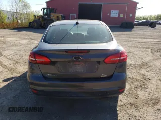 2018 Ford Focus SE z VIN 1FADP3FE4JL306237, wystawiony jako Copart lot #56482215 z przebiegiem 102 241 mil mil oraz Czysty tytuł • Clean title. Historia ofert i sprzedaży dostępna na DreamBid. Obrazek 6.