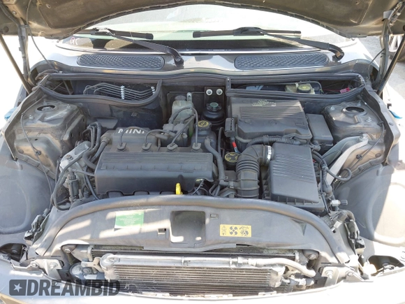 2006 MINI Hardtop with VIN WMWRC33566TJ76689, listed as a IAAI auction lot 42408697 with 153,382 mi miles and . Bid and sale history available at DreamBid. Image 10.