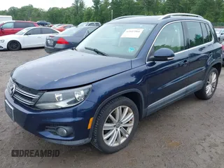 2012 Volkswagen Tiguan SE with VIN WVGBV7AX7CW552641, listed as a IAAI auction lot 42547566 with 184,617 mi miles and . Bid and sale history available at DreamBid. Image 2.