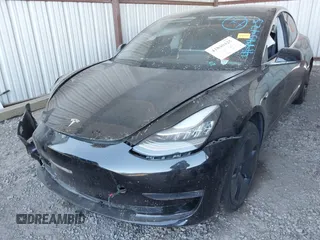 2019 Tesla Model 3 Mid Range with VIN 5YJ3E1EA4KF399151, listed as a IAAI auction lot 41840425 with Not Provided miles and . Bid and sale history available at DreamBid. Image 12.