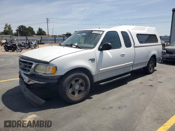 2003 Ford F-150 XL with VIN 2FTRX17L23CA17128, listed as a Copart auction lot 60144965 with 121,055 mi miles and Salvage title. Bid and sale history available at DreamBid. Image 1.