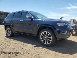2017 Jeep Grand Cherokee Overland with VIN 1C4RJFCG0HC943029, listed as a Copart auction lot 63073985 with 100,550 mi miles and Clean title. Bid and sale history available at DreamBid. Image 4.