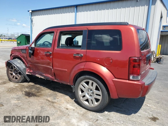 2010 Dodge Nitro Heat with VIN 1D4PT4GKXAW156990, listed as a Copart auction lot 54610695 with 180,620 mi miles and Salvage title. Bid and sale history available at DreamBid. Image 2.
