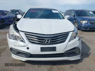 2015 Hyundai Azera Limited with VIN KMHFH4JG7FA476458, listed as a IAAI auction lot 41893979 with 149,114 mi miles and . Bid and sale history available at DreamBid. Image 12.