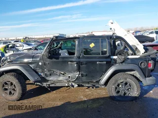2020 Jeep Wrangler Unlimited Sport S с VIN 1C4HJXDG1LW237484, выставлен на аукционе IAAI как лот 41310965 с пробегом Не указан миль и . История ставок и продаж доступна на DreamBid. Изображение 14.