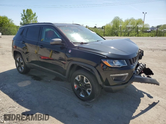 2018 Jeep Compass Trailhawk with VIN 3C4NJDDB6JT231480, listed as a Copart auction lot 56474865 with 61,051 mi miles and Salvage title. Bid and sale history available at DreamBid. Image 4.