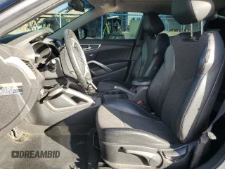 2013 Hyundai Veloster w/Black Int z VIN KMHTC6AD0DU135773, wystawiony jako Copart lot #41367875 z przebiegiem 96 487 mil mil oraz Szkoda całkowita • Salvage title. Historia ofert i sprzedaży dostępna na DreamBid. Obrazek 7.