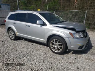 2011 Dodge Journey Crew with VIN 3D4PG3FGXBT571987, listed as a Copart auction lot 53959565 with 152,716 mi miles and Salvage title. Bid and sale history available at DreamBid. Image 4.