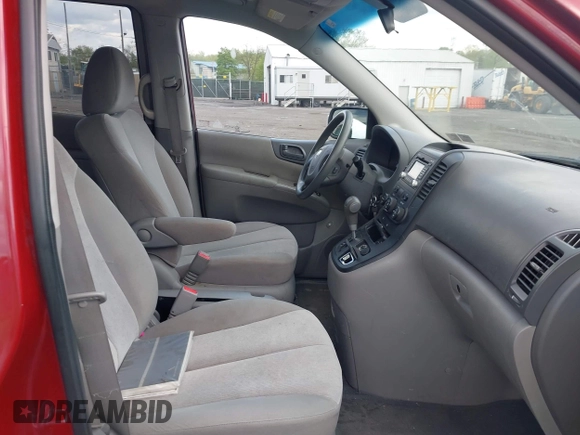 2012 Kia Sedona LX with VIN KNDMG4C76C6453523, listed as a IAAI auction lot 42189376 with 207,557 mi miles. Bid and sale history available at carsss.com. Image 5.