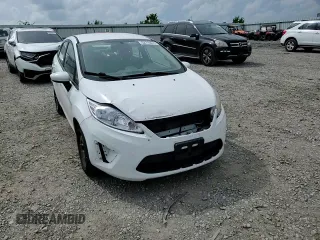 2013 Ford Fiesta S z VIN 3FADP4AJ5DM140467, wystawiony jako Copart lot #54718675 z przebiegiem 135 949 mil mil oraz Szkoda całkowita • Salvage title. Historia ofert i sprzedaży dostępna na DreamBid. Obrazek 13.