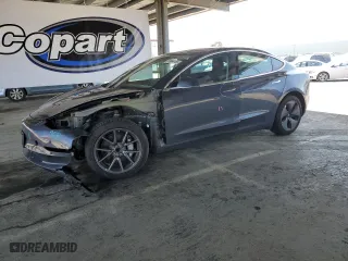 2018 Tesla Model 3 Long Range Battery with VIN 5YJ3E1EA2JF157683, listed as a Copart auction lot 53864165 with 72,736 mi miles and Salvage Title. Bid and sale history available at carsss.com. Image 1.