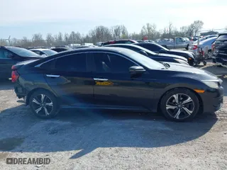 2016 Honda Civic Sedan Touring with VIN 19XFC1F9XGE043422, listed as a IAAI auction lot 41930030 with 141,027 mi miles. Bid and sale history available at carsss.com. Image 13.