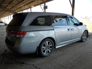 2017 Honda Odyssey Touring с VIN 5FNRL5H94HB003561, выставлен на аукционе Copart как лот 87223524 с пробегом 102 985 миль миль и Списание • Salvage title. История ставок и продаж доступна на DreamBid. Изображение 3.