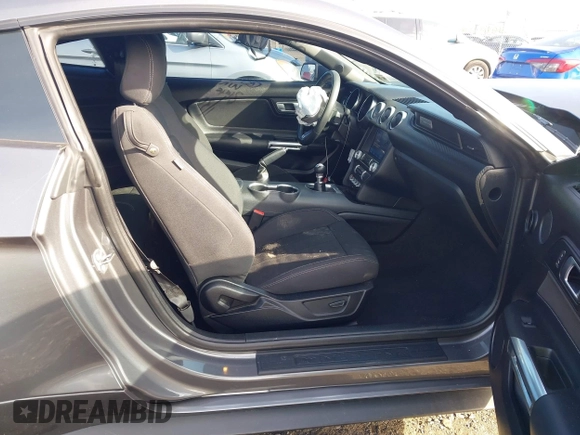 2021 Ford Mustang EcoBoost with VIN 1FA6P8TH4M5136345, listed as a IAAI auction lot 41503885 with 18,853 mi miles. Bid and sale history available at carsss.com. Image 5.