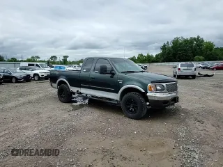 2001 Ford F-150 XL z VIN 1FTRX18L41NB56019, wystawiony jako Copart lot #62537655 z przebiegiem Nie podano mil oraz Szkoda całkowita • Salvage title. Historia ofert i sprzedaży dostępna na DreamBid. Obrazek 13.