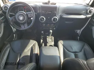 2015 Jeep Wrangler Unlimited Rubicon with VIN 1C4BJWFG1FL750561, listed as a Copart auction lot 60797075 with 95,677 mi miles and Salvage title. Bid and sale history available at DreamBid. Image 8.