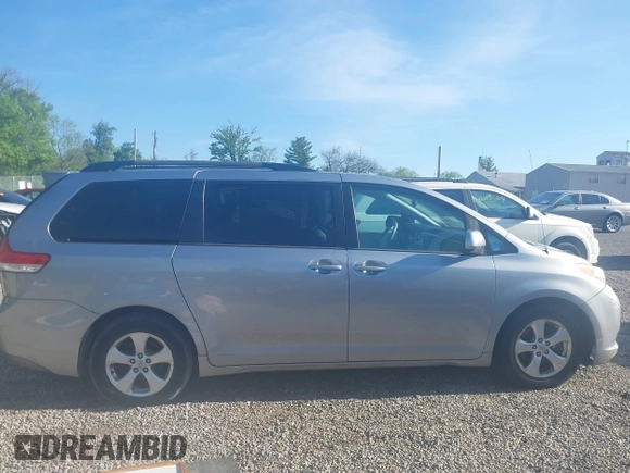 2013 Toyota Sienna LE AAS with VIN 5TDKK3DCXDS369976, listed as a IAAI auction lot 42161009 with 183,408 mi miles. Bid and sale history available at carsss.com. Image 13.