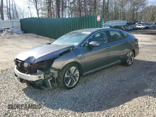 2018 Honda Clarity Touring z VIN JHMZC5F37JC010018, wystawiony jako Copart lot #48376525 z przebiegiem 111 727 mil mil oraz Szkoda całkowita • Salvage title. Historia ofert i sprzedaży dostępna na DreamBid. Obrazek 1.