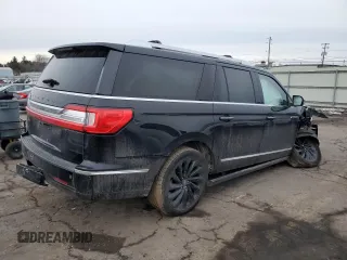 2021 Lincoln Navigator Black Label z VIN 5LMJJ3TT1MEL03959, wystawiony jako Copart lot #43876275 z przebiegiem Nie podano mil oraz Szkoda całkowita • Salvage title. Historia ofert i sprzedaży dostępna na DreamBid. Obrazek 3.