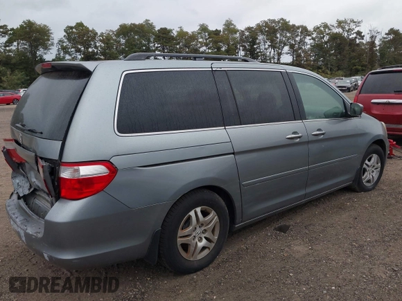 2005 Honda Odyssey EX-L with VIN 5FNRL38625B041067, listed as a IAAI auction lot 40519464 with 117,606 mi miles and . Bid and sale history available at carsss.com. Image 4.