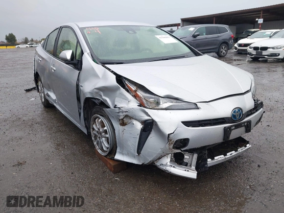 2022 Toyota Prius L Eco with VIN JTDKAMFU1N3177055, listed as a IAAI auction lot 41506862 with 121,318 mi miles and . Bid and sale history available at DreamBid. Image 6.