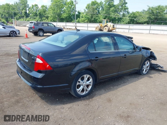 2012 Ford Fusion SE with VIN 3FAHP0HA0CR374615, listed as a IAAI auction lot 42594819 with 124,168 mi miles and . Bid and sale history available at DreamBid. Image 4.