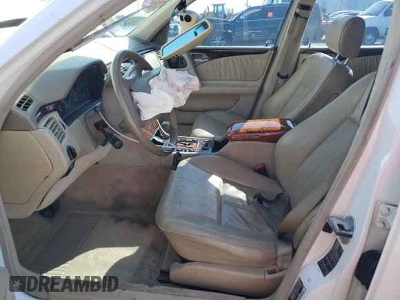 1999 Mercedes-Benz E-Class with VIN WDBJF65HXXA914389, listed as a Copart auction lot 72935884 with 192,084 mi miles and Salvage Title. Bid and sale history available at carsss.com. Image 7.