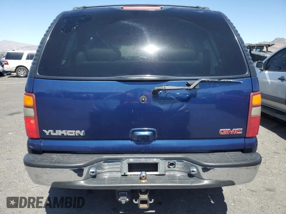 2001 GMC Yukon SLT z VIN 1GKEK13T41J138068, wystawiony jako Copart lot #52823455 z przebiegiem 163 319 mil mil oraz Szkoda całkowita • Salvage title. Historia ofert i sprzedaży dostępna na DreamBid. Obrazek 6.