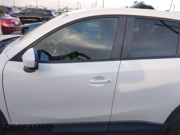 2014 Mazda CX-5 Touring with VIN JM3KE2CY8E0321578, listed as a IAAI auction lot 41769930 with 101,724 mi miles. Bid and sale history available at carsss.com. Image 14.