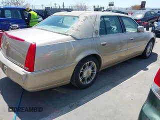 2006 Cadillac DTS w/1SC with VIN 1G6KD57Y26U112518, listed as a IAAI auction lot 42100747 with 122,149 mi miles. Bid and sale history available at carsss.com. Image 4.