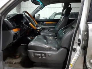 2005 Lexus GX 470 z VIN JTJBT20X250091141, wystawiony jako Copart lot #56942925 z przebiegiem 220 272 mil mil oraz Tytuł czysty. Historia ofert i sprzedaży dostępna na DreamBid. Obrazek 7.