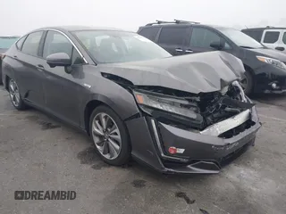 2018 Honda Clarity z VIN JHMZC5F15JC009223, wystawiony jako IAAI lot #41626369 z przebiegiem 46 014 mil mil oraz . Historia ofert i sprzedaży dostępna na DreamBid. Obrazek 1.