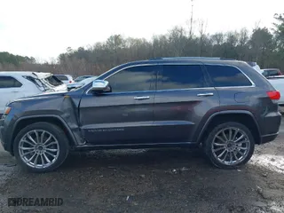 2014 Jeep Grand Cherokee Overland with VIN 1C4RJFCT8EC183165, listed as a IAAI auction lot 41298114 with 114,187 mi miles. Bid and sale history available at carsss.com. Image 14.