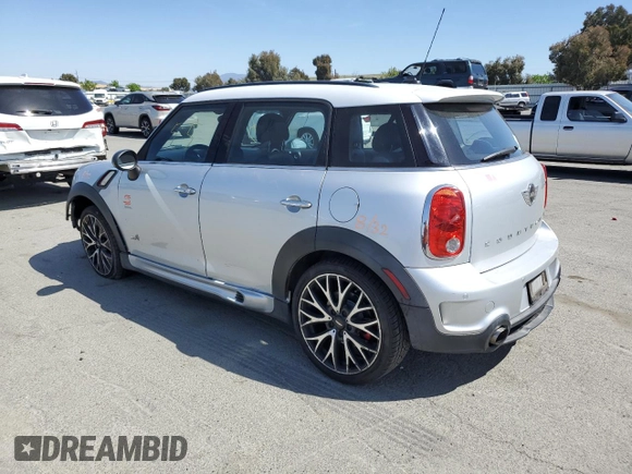 2014 MINI Countryman John Cooper Works with VIN WMWXD1C54EWS34594, listed as a Copart auction lot 55201045 with 94,899 mi miles and Salvage Title. Bid and sale history available at DreamBid. Image 2.