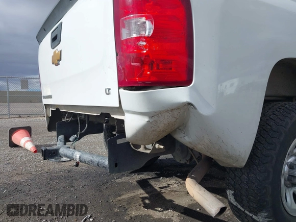 2013 Chevrolet Silverado 1500 LT with VIN 3GCPCSEA6DG176264, listed as a IAAI auction lot 41248694 with 173,165 mi miles and . Bid and sale history available at DreamBid. Image 6.