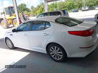 2015 Kia Optima EX z VIN 5XXGN4A72FG350868, wystawiony jako IAAI lot #42242887 z przebiegiem 222 208 mil mil oraz . Historia ofert i sprzedaży dostępna na DreamBid. Obrazek 15.