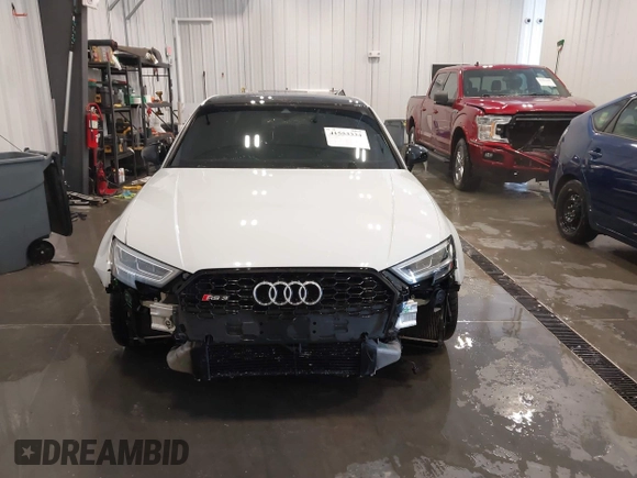 2019 Audi RS 3 z VIN WUABWGFF2KA900300, wystawiony jako IAAI lot #41553334 z przebiegiem 46 004 mil mil oraz . Historia ofert i sprzedaży dostępna na DreamBid. Obrazek 13.